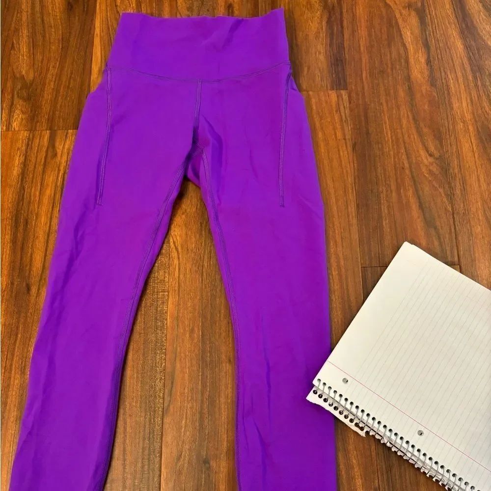 LuLuLemon Fast and Free High Rise Tight Leggings with side pockets bright purple